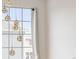 Modern hanging lights decorate the home near a sunny window at 8251 W 54Th Ave # 4, Arvada, CO 80002
