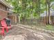 Backyard patio with red chairs and grill at 2303 - 2305 W 32Nd Ave, Denver, CO 80211