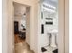 Hallway view of bedroom and bathroom with hardwood floors at 2303 - 2305 W 32Nd Ave, Denver, CO 80211