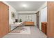 Bright home office with contemporary desk, shelving unit, neutral walls, and natural light at 18083 E Atlantic Dr, Aurora, CO 80013