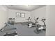 Well-equipped workout room features modern exercise machines, free weights and motivational artwork at 18083 E Atlantic Dr, Aurora, CO 80013