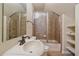 Well-lit bathroom featuring tile in shower and tile flooring with shelves and a mirror at 575 Howling Cir, Elizabeth, CO 80107