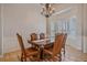Elegant dining room featuring natural light and an attractive light fixture at 575 Howling Cir, Elizabeth, CO 80107