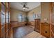 Home office featuring wood paneling, a window, and ample natural light at 575 Howling Cir, Elizabeth, CO 80107