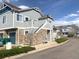 View of several townhomes with well-maintained landscaping and convenient street access at 23465 E Platte Dr # C, Aurora, CO 80016