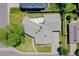Aerial view showing the roof, yard, landscaping and neighborhood at 6220 E 5Th Ave, Denver, CO 80220