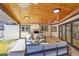 Relaxing covered patio with built-in fireplace and seating at 6220 E 5Th Ave, Denver, CO 80220