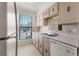 Cozy kitchen with plenty of counter space and natural light from the window at 3662 S Granby Way # J05, Aurora, CO 80014