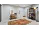 Bright art room with easel, shelving, and ample natural light, perfect for creative projects at 6338 Spotted Fawn Run, Littleton, CO 80125