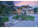 Charming two-story home with professionally landscaped yard, stone path and covered entry at 6338 Spotted Fawn Run, Littleton, CO 80125