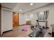 Finished basement with space for exercise equipment, and a closet at 7202 Snow Peak Ct, Niwot, CO 80503