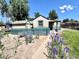 Home with a private backyard with a vintage-style shed and a picket fence at 1270 Havana St, Aurora, CO 80010