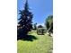 Large backyard features a well-manicured lawn and a gazebo, great for relaxing outdoors at 1270 Havana St, Aurora, CO 80010