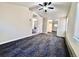 Bedroom with unique carpet, and a ceiling fan; offering a comfortable living space at 1270 Havana St, Aurora, CO 80010