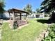 Cozy gazebo in a green backyard, ideal for outdoor gatherings and relaxation at 1270 Havana St, Aurora, CO 80010