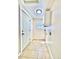 Laundry room with tile floor and storage at 1270 Havana St, Aurora, CO 80010