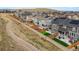 Aerial view of homes with fenced yards, landscaping, and community walking paths at 718 176Th Ave, Broomfield, CO 80023