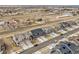 Street view of a neighborhood with modern homes, garages, and well-kept lawns at 718 176Th Ave, Broomfield, CO 80023