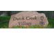 Welcome to Dutch Creek Village, a beautiful community surrounded by lush landscaping and vibrant flowers at 6336 S Newland Ct, Littleton, CO 80123