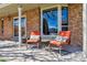 Inviting front porch with comfortable seating and a view of the neighborhood at 6336 S Newland Ct, Littleton, CO 80123