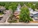 Aerial view of a home surrounded by mature trees and neighboring houses in a suburban neighborhood at 3201 W 126Th Ave, Broomfield, CO 80020