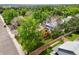 Aerial view of the home featuring mature trees, a fenced yard, and well-maintained lawn at 3201 W 126Th Ave, Broomfield, CO 80020