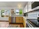 Kitchen showcases stainless steel appliances and bright natural light at 3201 W 126Th Ave, Broomfield, CO 80020