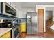 Kitchen features stainless steel refrigerator, microwave, and range at 3201 W 126Th Ave, Broomfield, CO 80020