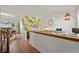 Bright loft area featuring colorful wall art, hardwood floors, and open layout at 3201 W 126Th Ave, Broomfield, CO 80020