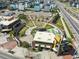 Aerial view of community park showcasing green space, amphitheater-style seating, and nearby brewery at 1365 W 67Th Pl, Denver, CO 80221