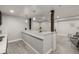 Finished basement with a bar area, perfect for entertaining guests at 1365 W 67Th Pl, Denver, CO 80221