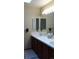 Bathroom featuring a double sink and vanity at 7490 W Coal Mine Ave # A, Littleton, CO 80123