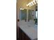 Bathroom features a single sink vanity and mirrored medicine cabinets at 7490 W Coal Mine Ave # A, Littleton, CO 80123