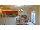 Eat-in kitchen with modern stainless appliances and natural light at 7490 W Coal Mine Ave # A, Littleton, CO 80123