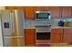 Modern kitchen featuring stainless steel appliances and granite countertops at 7490 W Coal Mine Ave # A, Littleton, CO 80123