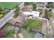 Drone shot of home highlighting outdoor features, spacious backyard, and overall property size within the neighborhood at 100 Balsam St, Lakewood, CO 80226