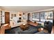 Expansive living room with an open layout, seamless flow and access to other living spaces at 100 Balsam St, Lakewood, CO 80226