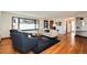 Open living space features hardwood floors, natural light and stylish furnishings throughout at 100 Balsam St, Lakewood, CO 80226