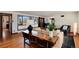 Spacious living room with hardwood flooring, large windows and contemporary furnishings at 100 Balsam St, Lakewood, CO 80226