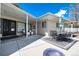 Covered patio with outdoor dining and seating, perfect for entertaining at 100 Balsam St, Lakewood, CO 80226