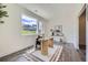 Home office with a desk, stylish decor, large window, and view providing an ideal workspace at 682 Belay St, Erie, CO 80516