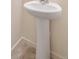 Simple bathroom pedestal sink at 2212 Crosswind St, Fort Lupton, CO 80621