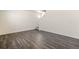 Inviting room featuring modern floors, neutral walls, and a staircase at 2212 Crosswind St, Fort Lupton, CO 80621