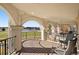 Outdoor balcony featuring picturesque views and plenty of natural light, plus iron detailing at 73 Glenmoor Dr, Cherry Hills Village, CO 80113