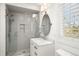 Bathroom featuring a glass-enclosed shower and marble vanity top with an oval mirror at 73 Glenmoor Dr, Cherry Hills Village, CO 80113