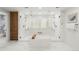 Modern bathroom featuring a soaking tub, double shower, and marble tile at 73 Glenmoor Dr, Cherry Hills Village, CO 80113