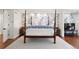 Elegant main bedroom featuring a four-poster bed, floral wallpaper, and hardwood floors at 73 Glenmoor Dr, Cherry Hills Village, CO 80113