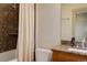 Cozy bathroom features decorative tiles in the shower/tub combination at 180 Outpost Ln, Evergreen, CO 80439