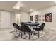 This game room offers a poker table surrounded by chairs and movie posters for entertainment at 476 Silver Rock Trl, Castle Rock, CO 80104