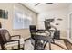 This office has dual windows, a comfortable chair, and space for dual monitors at 476 Silver Rock Trl, Castle Rock, CO 80104